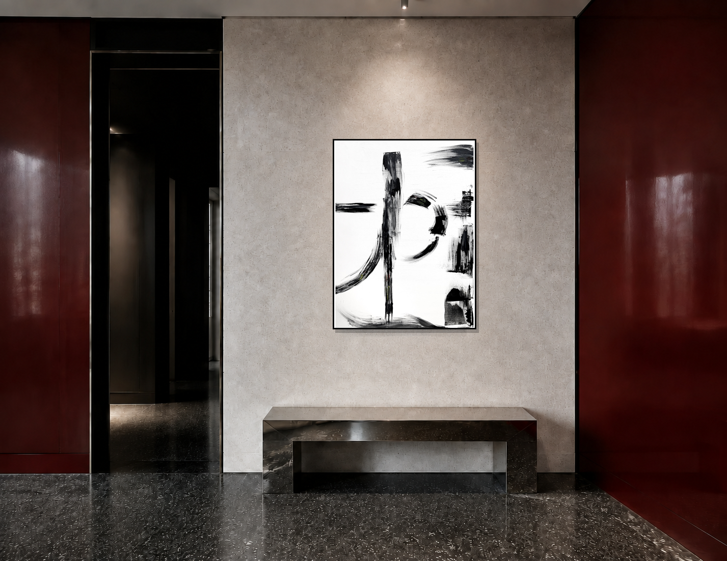A framed abstract black and white painting hangs on a textured beige wall in a modern interior hallway with dark wood doors and a stone bench below.