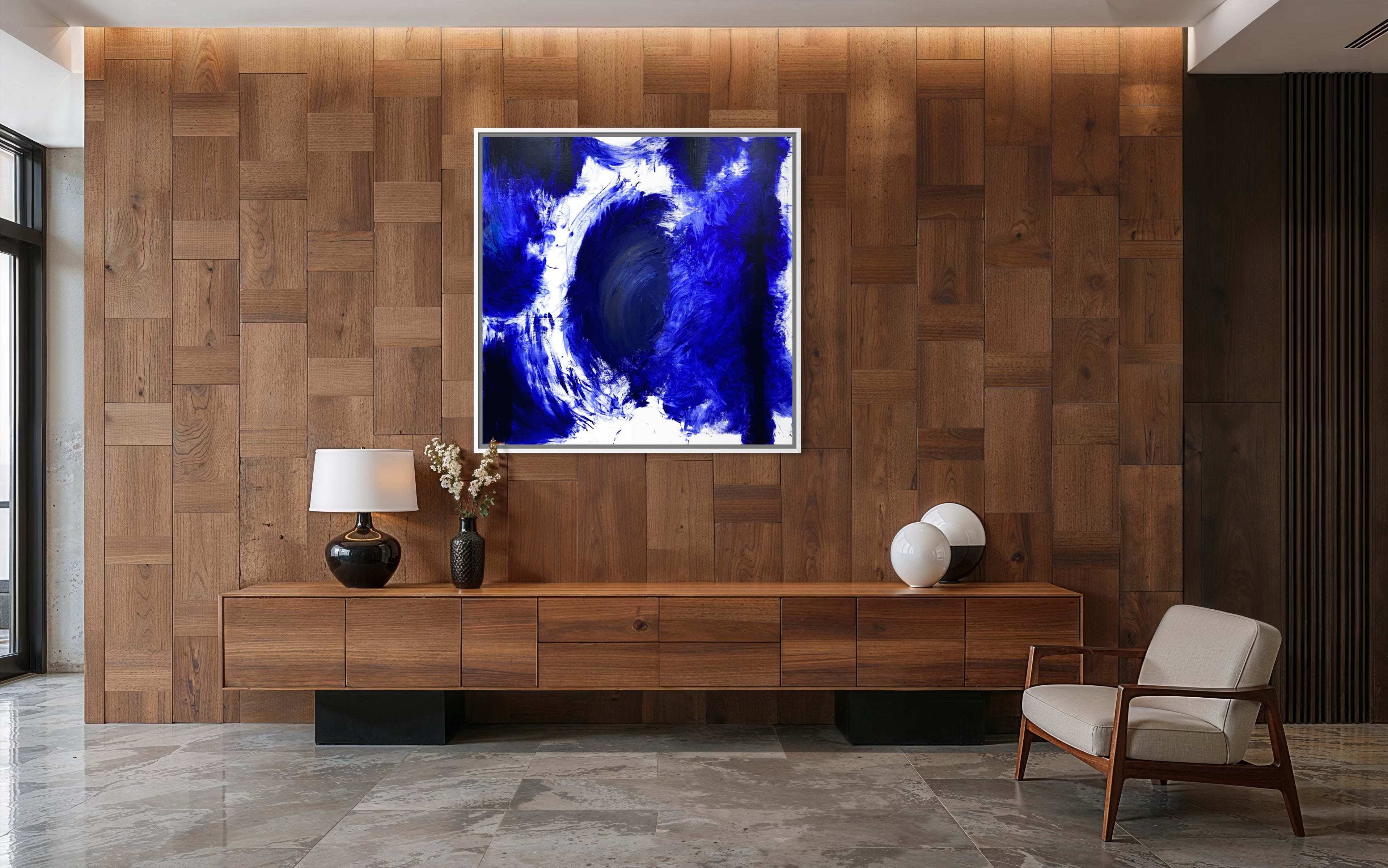 Modern interior with wooden wall, television, and chair.